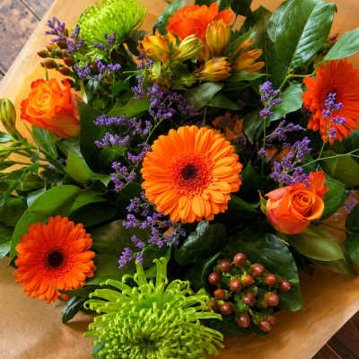 Florist Choice Hand-tied - Seasonal hand-tie delivered in water, seasonal mix of flowers in a colour scheme of your choice or leave it up to us.