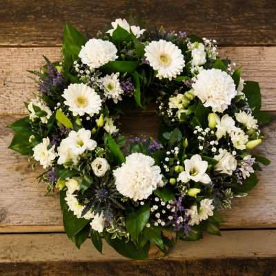 Wreath - A traditional wreath arranged in your choice of colours.