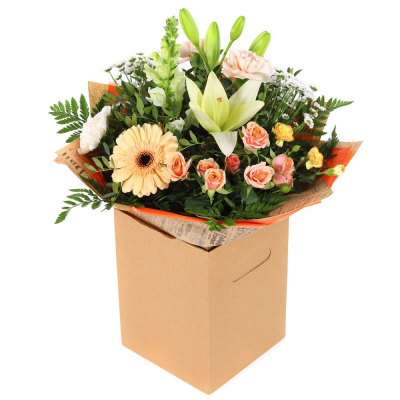 Lighter shades of Autumn - A collection of subtle autumnal colours and flowers, creams and peaches with touches of the orange glow. Including lilies, this bouquet scents the air and creates a gorgeous setting for any room.