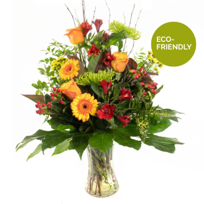 Vibrant Vase - A vibrant autumnal collection of flowers, delivered already in a vase - oranges, reds and yellows to perfectly suit the season.